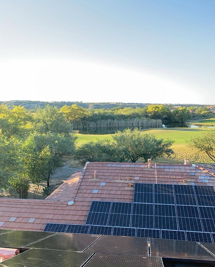 Solar installation overlooking a green landscape